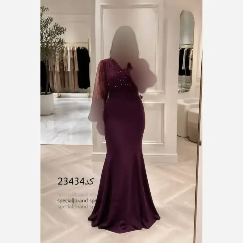 ماکسی مجلسی زنانه ستاره کرپ کش و تور مروارید دوزی شده کمربند دار