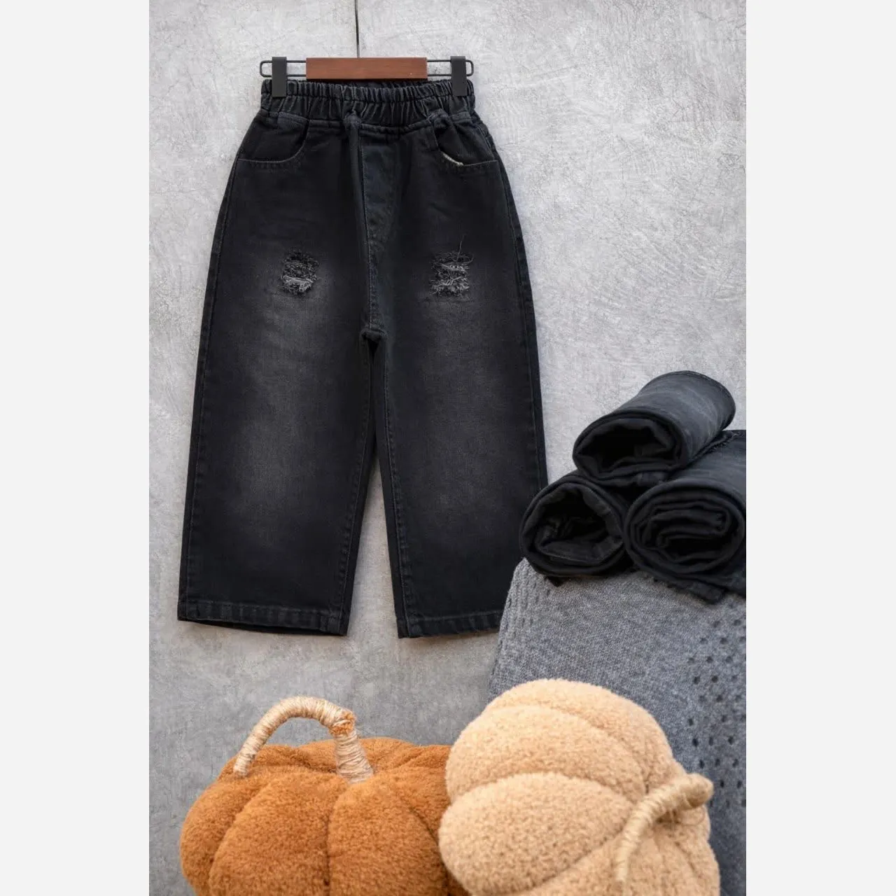 شلوار جین بگ ذغالی طرح زاپ سنگ شور شده
